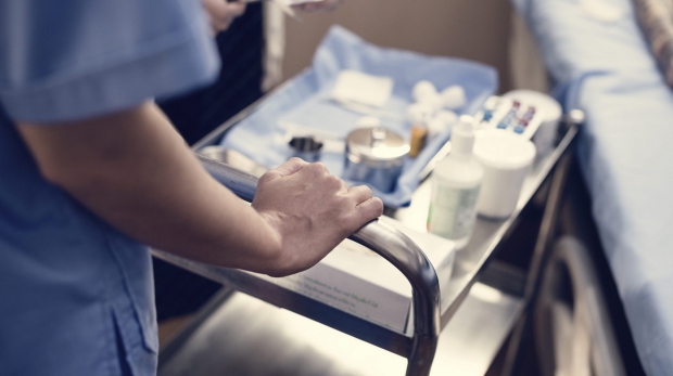 Nurse preparing medical equipments